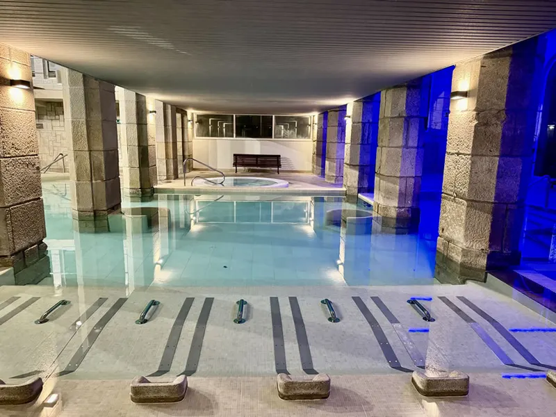 Long indoor pool with water jets