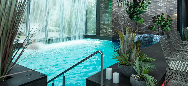 Spa pool with a waterfall at Baltic Beach Hotel & SPA
