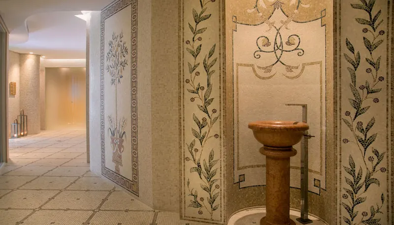 Thermal suite corridor with a stone fountain