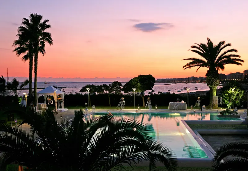 Pool and gardens at sunset