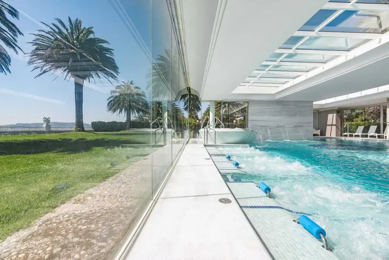 Long indoor thermal pool under skylights