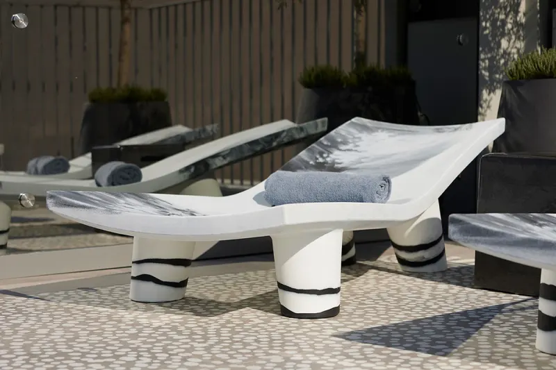 Pool deck with city view