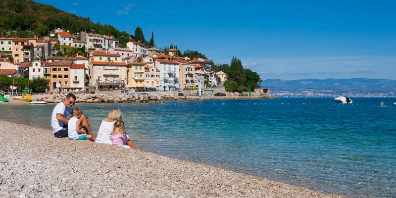 Pebble beach below the village