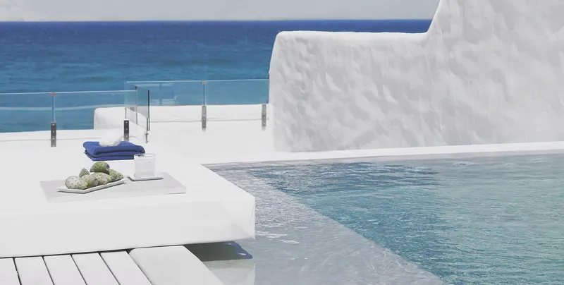 Pool with the sea behind it
