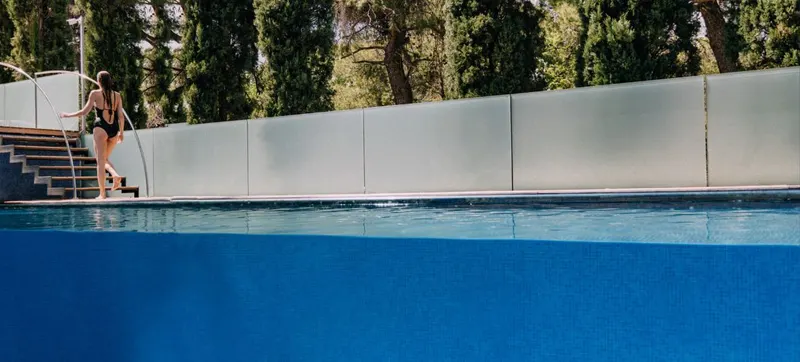 Wide view of the glass-wall pool