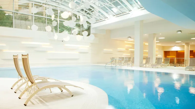 Pool with deckchairs