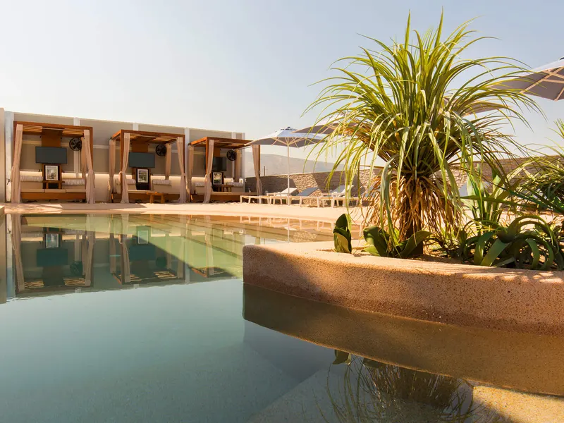Sunbeds on the sand-covered roof