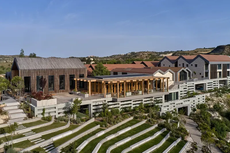 Aerial view of the resort buildings and terraced gardens