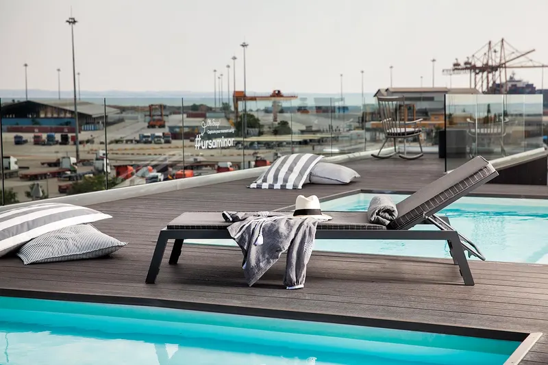 Rooftop pool with loungers