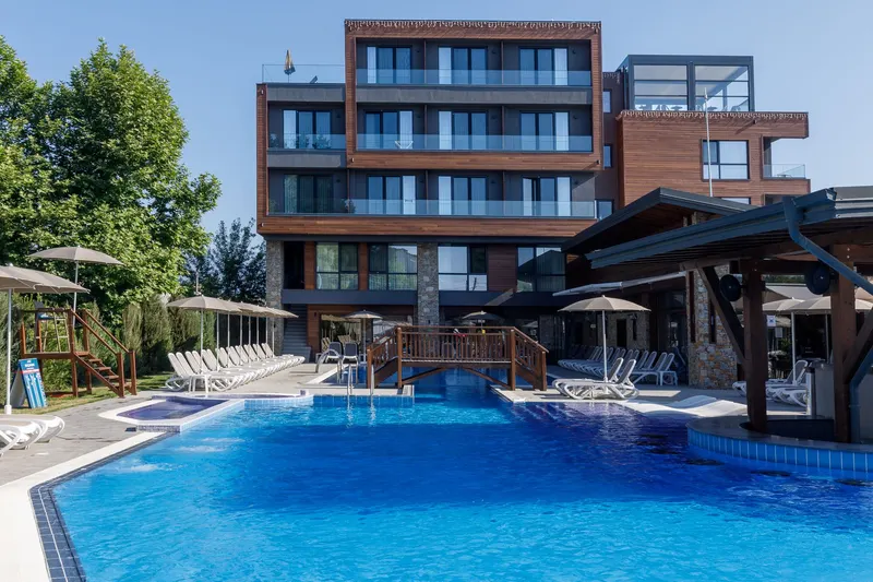 Family pool area and hotel building