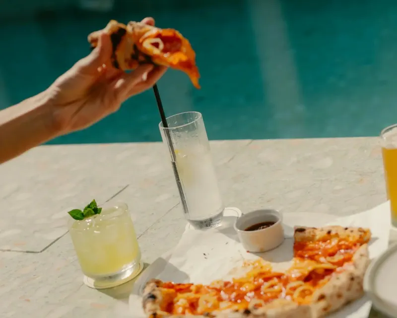 Pizza and drinks served on the pool deck